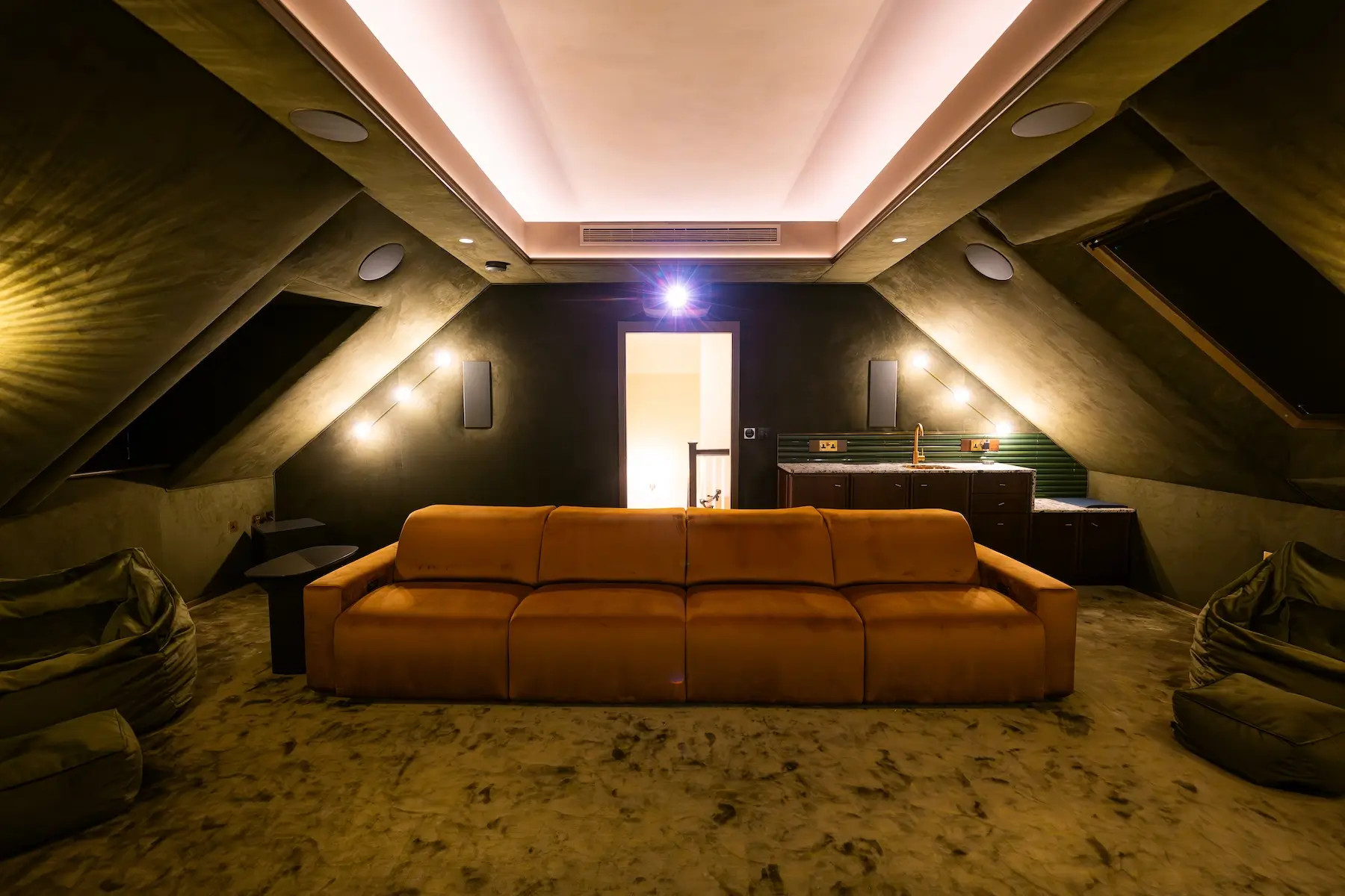 Back view of a cinema room in a Buckinghamshire property featuring Lutron installation