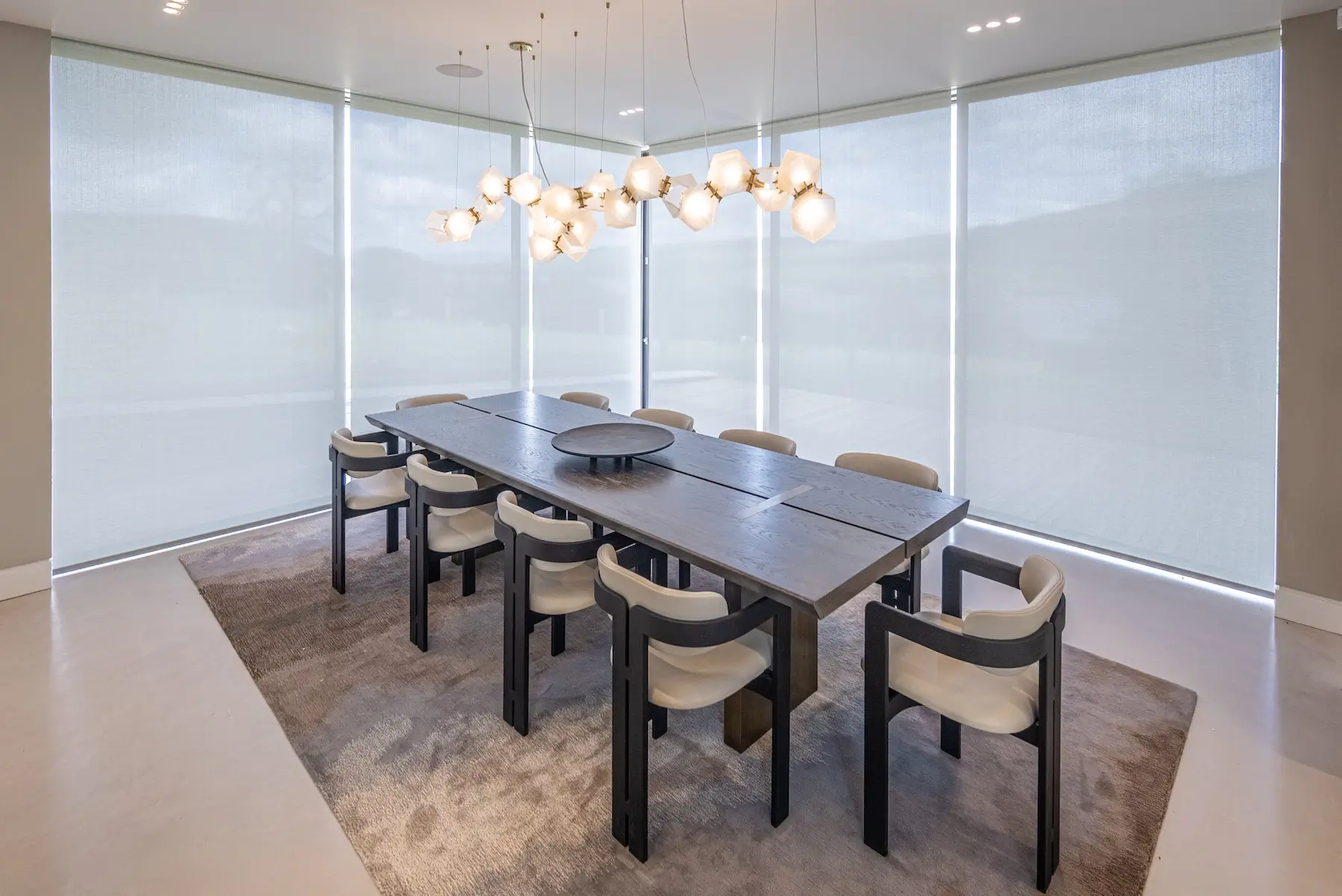 Lutron installation in Cumbria – dining area with blinds closed Dining area in a Cumbria property with Lutron blinds closed