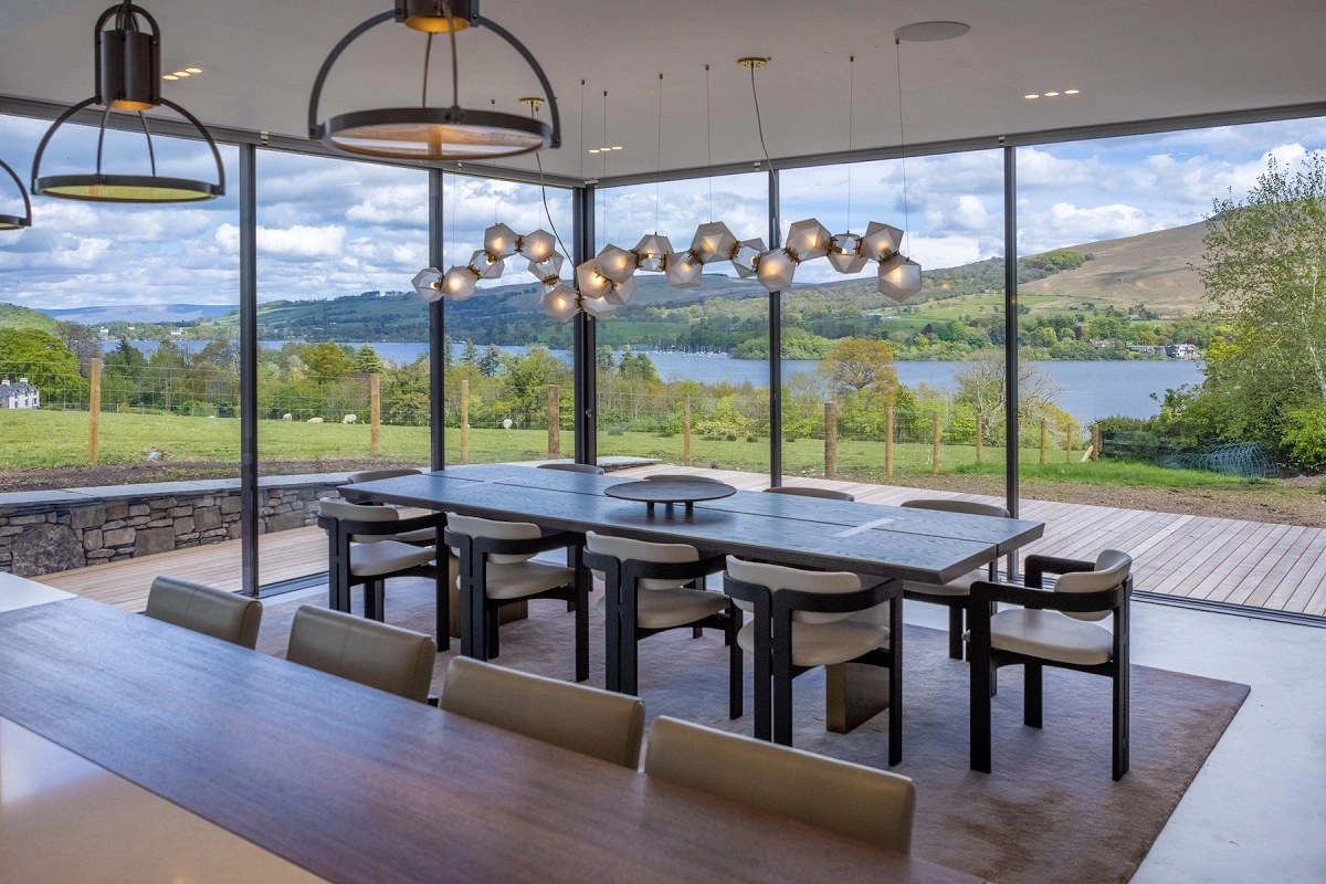 Lutron installation in Cumbria – dining area with blinds open Dining area in a Cumbria property with Lutron blinds open