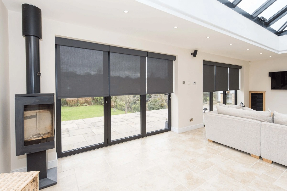 Lutron Triathlon blinds in North Leeds – living room | Clearly Automated Living room in a North Leeds property featuring Lutron Triathlon blinds